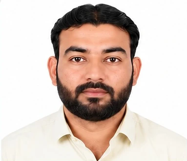Portrait of Moeen Javed in formal attire